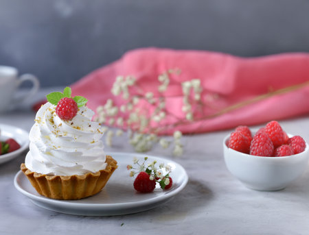 mini cake with meringue of shortbread dough for dessertの写真素材