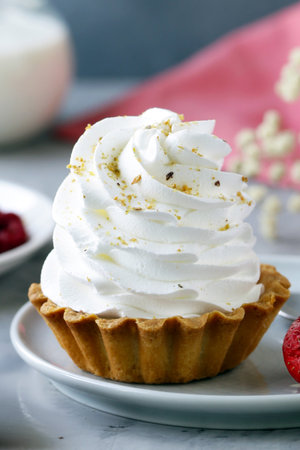 mini cake with meringue of shortbread dough for dessertの写真素材