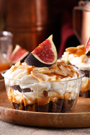 dessert trifle with fresh berries in a glassの写真素材