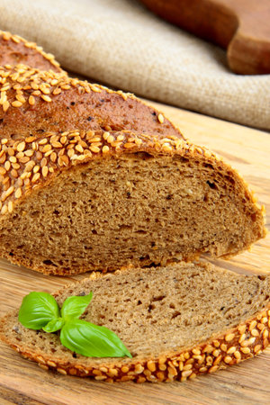 homemade rye bread loaf on a wooden tableの写真素材