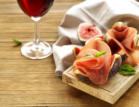 ham with figs antipasti for wineの写真素材