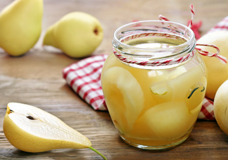 organic pears canned in syrup for dessertの写真素材