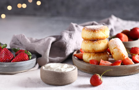 cheesecakes with fresh berries for breakfast healthy eatingの写真素材
