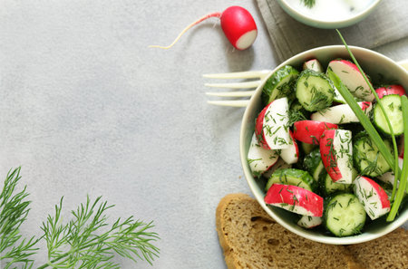 homemade salad with radish, dill and cucumberの写真素材