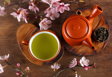 traditional green tea in a teapot and cupの写真素材