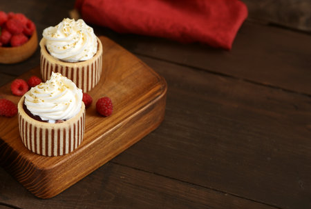 mini cake with berries and whipped cream