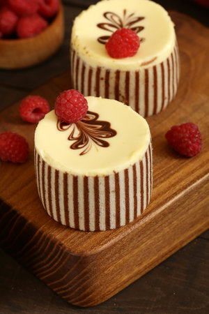 mini cake with berries and whipped creamの写真素材