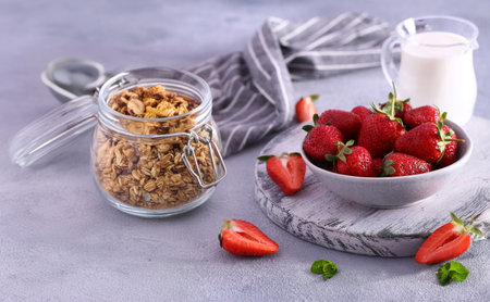 granola with berries for breakfast, healthy eatingの写真素材