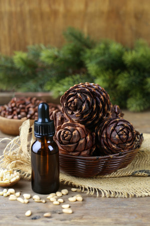 organic pine nut oil on wooden tableの写真素材