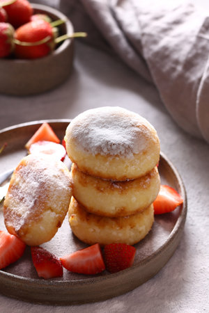 cheese pancakes with fresh berries for breakfastの写真素材