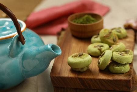 Japanese cookies with matcha tea for dessertの写真素材