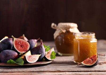 natural organic fig jam and fresh berriesの写真素材