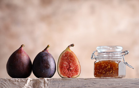natural organic fig jam and fresh berriesの写真素材