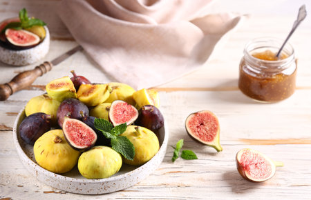 natural organic fig jam and fresh berriesの写真素材