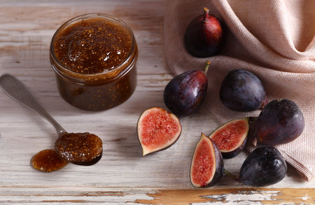 natural organic fig jam and fresh berriesの写真素材