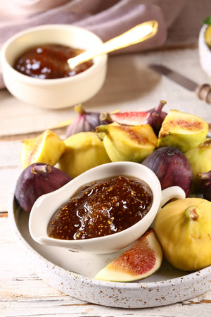 natural organic fig jam and fresh berriesの写真素材