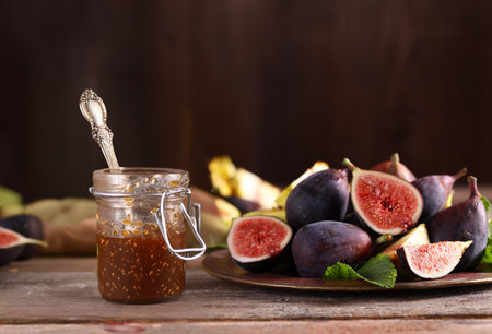 natural organic fig jam and fresh berriesの写真素材