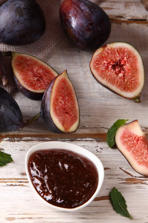 natural organic fig jam and fresh berriesの写真素材