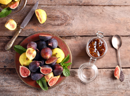 natural organic fig jam and fresh berriesの写真素材