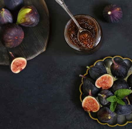 natural organic fig jam and fresh berriesの写真素材