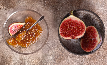 natural organic fig jam and fresh berriesの写真素材