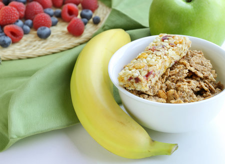 muesli with milk and fruit healthy food breakfastの写真素材