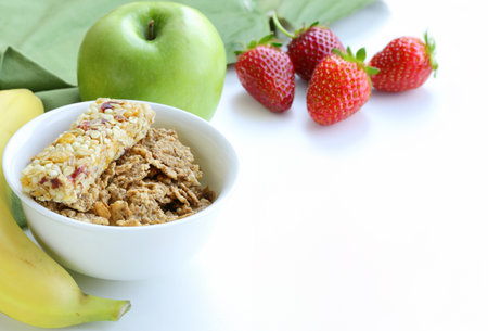 muesli with milk and fruit healthy food breakfastの写真素材