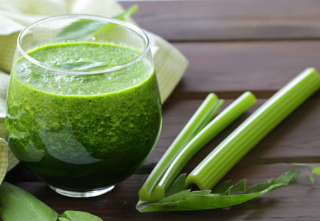 green celery spinach smoothie healthy eatingの写真素材