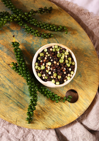 white, black and green peppercorns spicesの写真素材