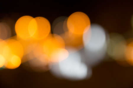Blurred Orange, Green, Blue And White Lights Assembling Assembling A Colorful Bokeh, Shot At Night In The City Of Alicante In Spainの写真素材