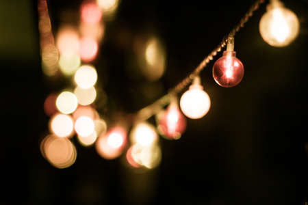 Chain Of Lights In Different Colous At A Little Party At Nightの写真素材