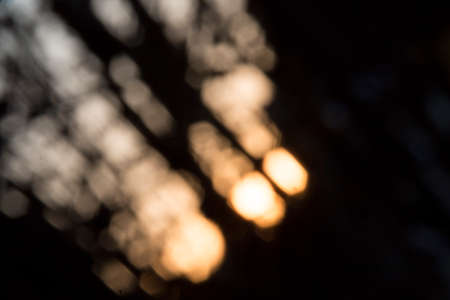 Blurry lights in the blue, white, beige, yellow and orange