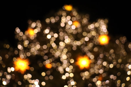 Out of focusHuge Christmas Tree with light stars on Striezelmarkt Chrsitmas market in Dresden