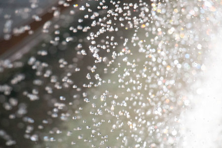 Air bubbles rising in water with sparkling highlights - abstract underwater texture