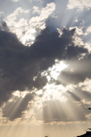 Golden clouds with dramatic sun rays-heavenly sky