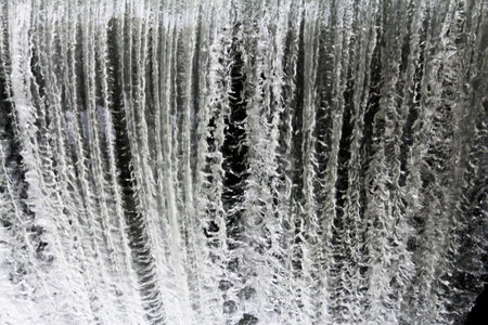 Turbulent grey water at a dam-abstract nature background