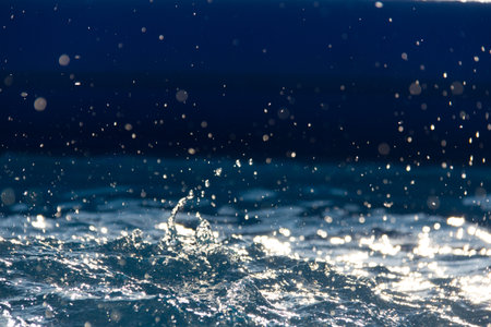 Dynamic blue and white water splash-abstract liquid motionの写真素材