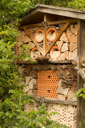 Wooden insect hotel with various natural materialsの写真素材
