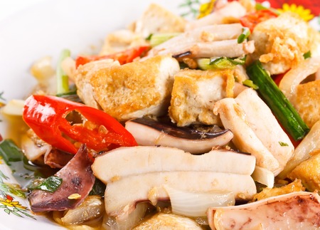 Thai fried food;squid;tofu;soybean and vegetables herbs fried with oil の写真素材