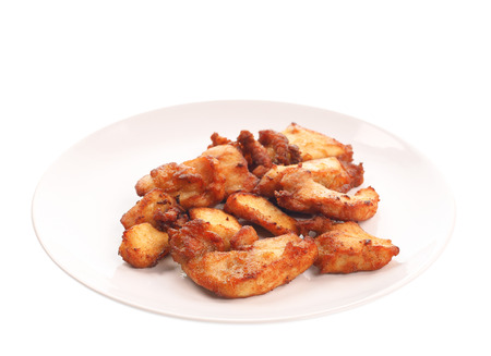 Fried chicken on plate isolated on white background.の写真素材
