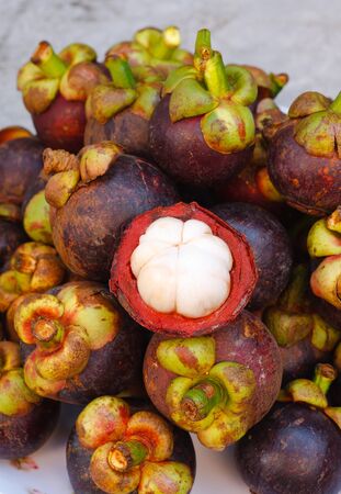 Stack of the ripe mangosteen fruit.の写真素材