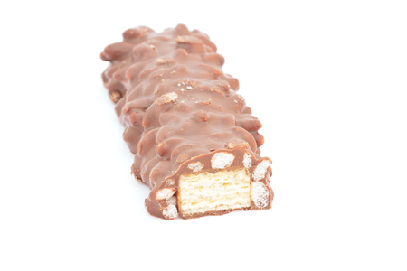 Cut the chocolate bar,which is seen inside on a white background.の写真素材