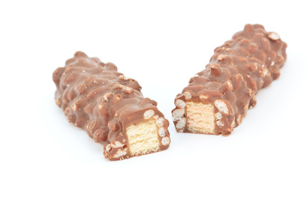 Cut the chocolate bar,which is seen inside on a white background.の写真素材