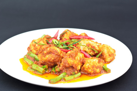 Thai food.Spicy stir fried fish balls with string bean and herbs.の写真素材