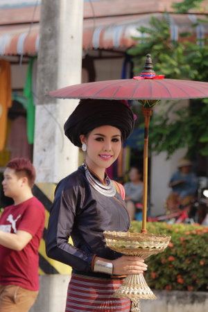 Phayao,Thailand - March 25 : Unidentified portrait of a Tai Lue ethnic girl wearing ethnic clothing during the annual festival on March 25,2017 in Phayao Province,Northern Thailand.のeditorial素材