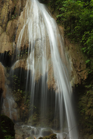 Flowing water of the waterfall  at Nam Min Waterfall Forest  Park in Northern Thailand.の写真素材