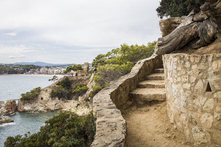 Beach off the coast of Lloret  Mar on the Costa Brava in Catalonia. View of the city and the beach from the sea.の写真素材