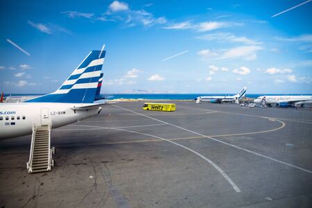 Stairs to the open plane.Morning at the airport. Airport on the island of Crete in Greece.