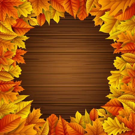 Autumn leaves frame on wooden backgroundのイラスト素材