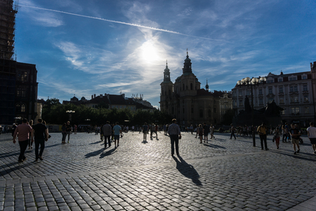 Guests of Prague walking at one of the city squares close to sunsetのeditorial素材